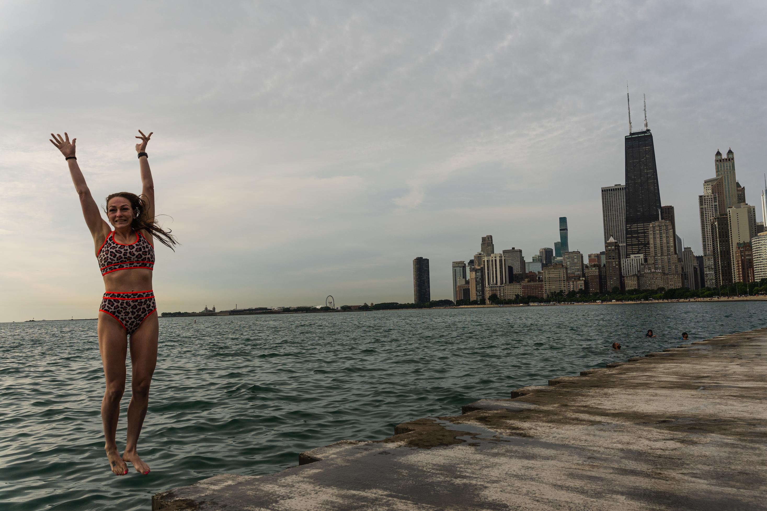 Participant jumps into Lake Michigan for Frosty Fridays near the Lincoln Park Chess Pavilion on June 24, 2026.